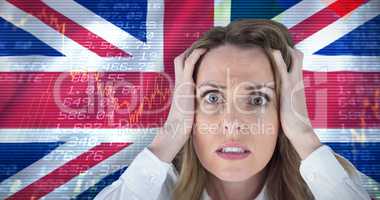 Composite image of stressed businesswoman with hands on her head