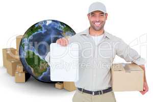 Composite image of delivery man with cardboard box showing clipboard