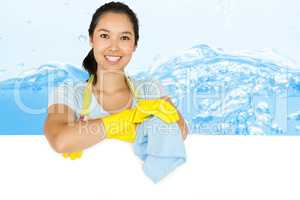 Composite image of smiling woman leaning on white surface