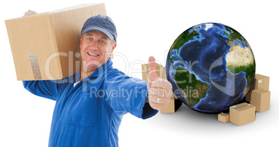 Composite image of happy delivery man holding cardboard box