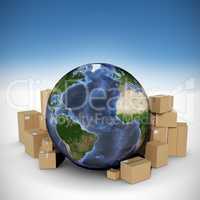 Composite image of globe surrounded by cardboard boxes
