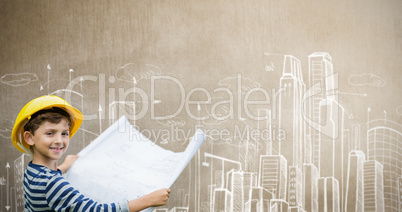 Composite image of boy in hard hat holding a plan