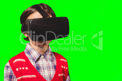 Composite image of close-up of boy wearing virtual reality simulator