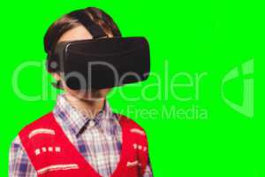 Composite image of close-up of boy wearing virtual reality simulator