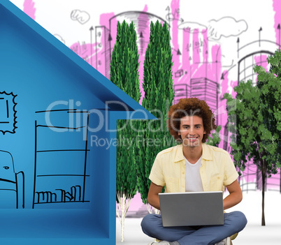 Composite image of smiling young man using laptop on floor