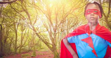 Composite image of boy in red cape
