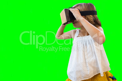 Composite image of girl wearing virtual reality simulator