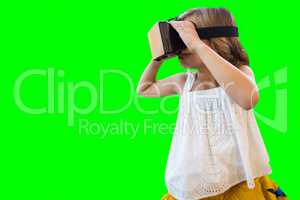 Composite image of girl wearing virtual reality simulator