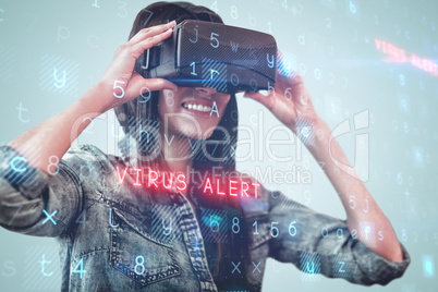 Composite image of woman using an oculus