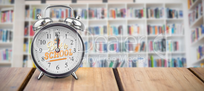 Composite image of alarm clock over white background