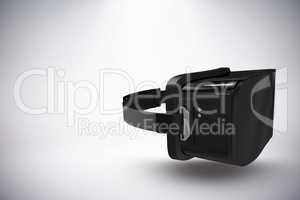 Composite image of black virtual reality simulator against white background