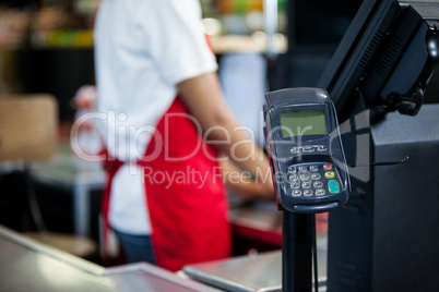 Credit card terminal at cash counter