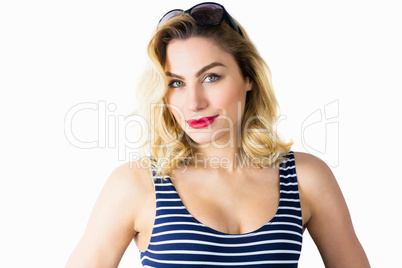 Portrait of beautiful woman posing against white background