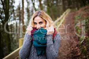 Beautiful smiling woman in forest