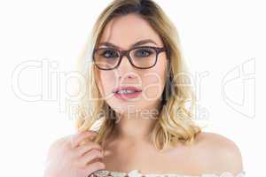 Portrait of beautiful woman with spectacles against white background