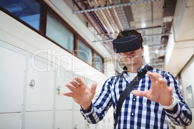 Student using virtual reality headset in locker room