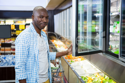 Man shopping in grocery section at supermarket