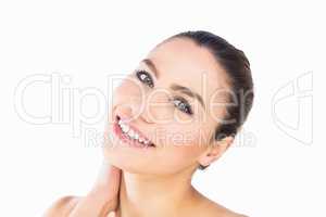 Portrait of beautiful woman smiling against white background