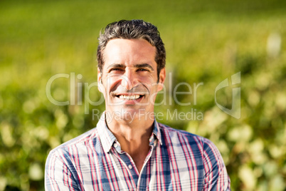 Portrait of smiling male vintner