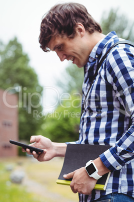 Student using mobile phone in campus