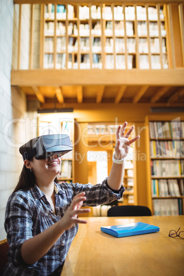 Female student using virtual reality headset