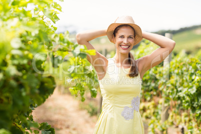 Portrait of female vintner in hat