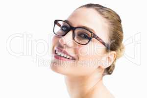 Portrait of beautiful woman posing with spectacles against white background