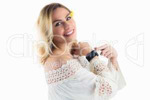 Portrait of beautiful woman posing with smartwatch