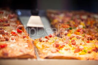 Close-up of pizza in display