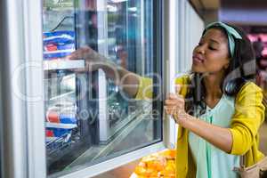 Woman shopping in grocery section