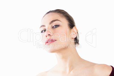 Portrait of beautiful woman posing against white background