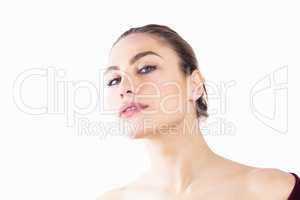 Portrait of beautiful woman posing against white background