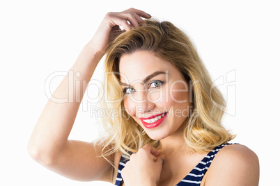 Portrait of beautiful woman posing against white background