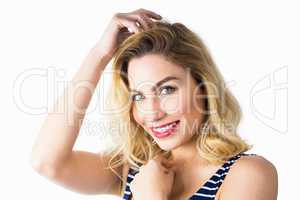 Portrait of beautiful woman posing against white background