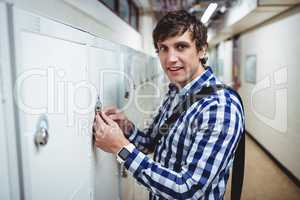 Student opening his locker