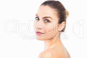 Portrait of beautiful woman posing against white background