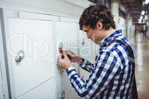 Student opening his locker