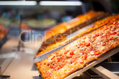 Close-up of pizza in display