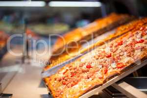 Close-up of pizza in display