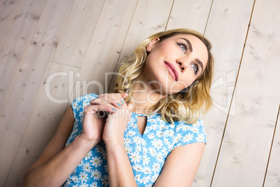 Smiling woman posing against texture background
