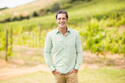 Portrait of vintner hands in pockets