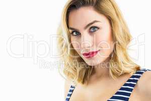 Portrait of beautiful woman posing against white background