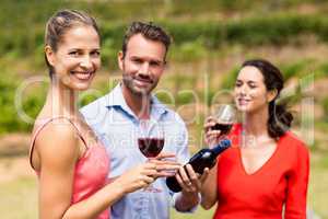 Happy friends having wine