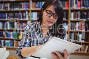 Female student using digital tablet