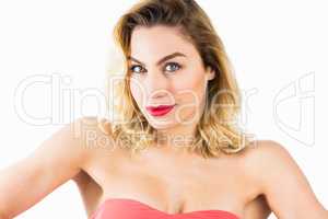 Portrait of beautiful woman posing against white background