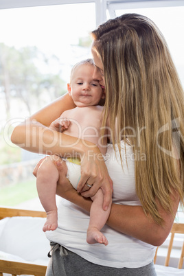 Mother holding her baby boy