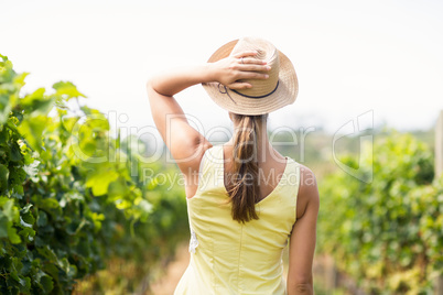 Female vintner in hat