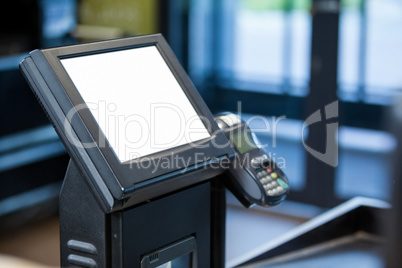 Billing machine and credit card terminal at cash counter