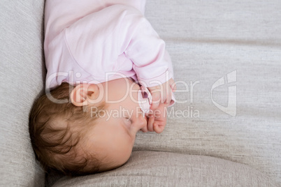 Baby sleeping with dummy in mouth