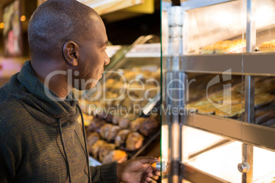 Man looking at display